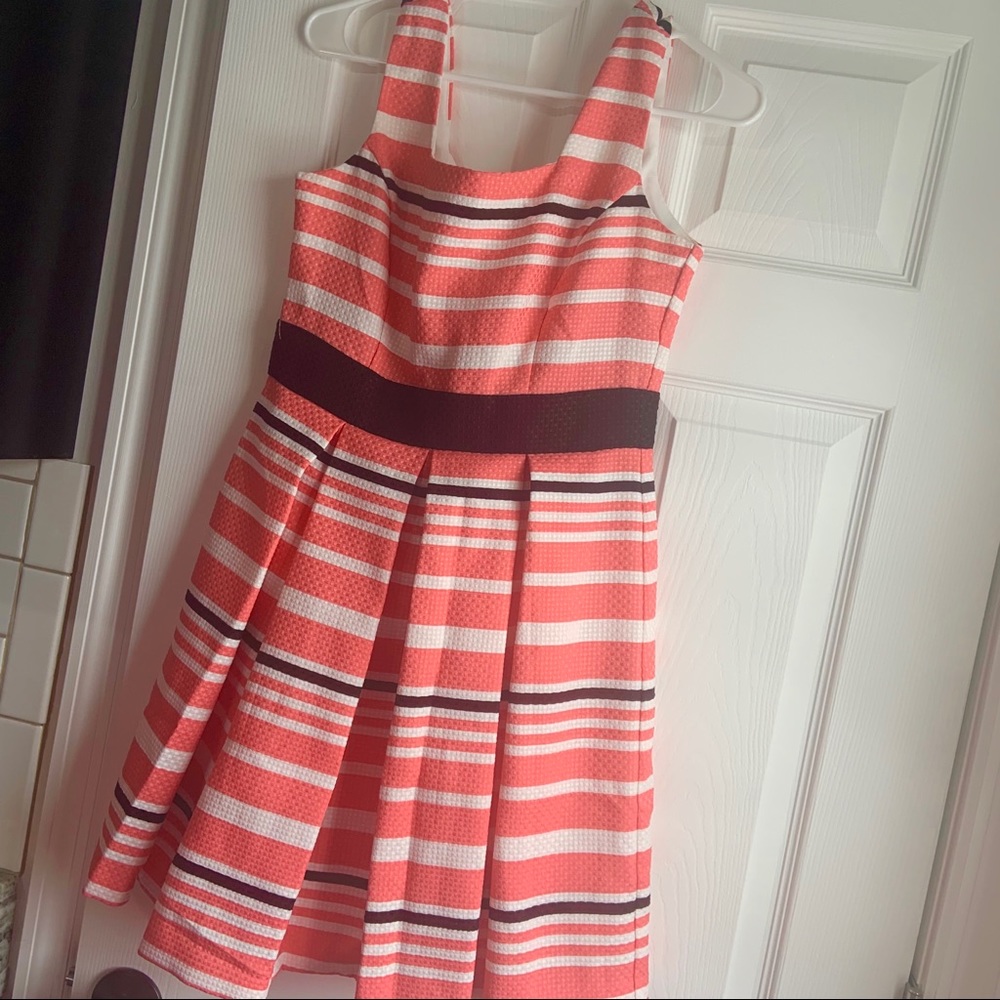 White coral and black fit and flare dress